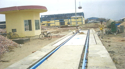 Rail cum road weigh bridge